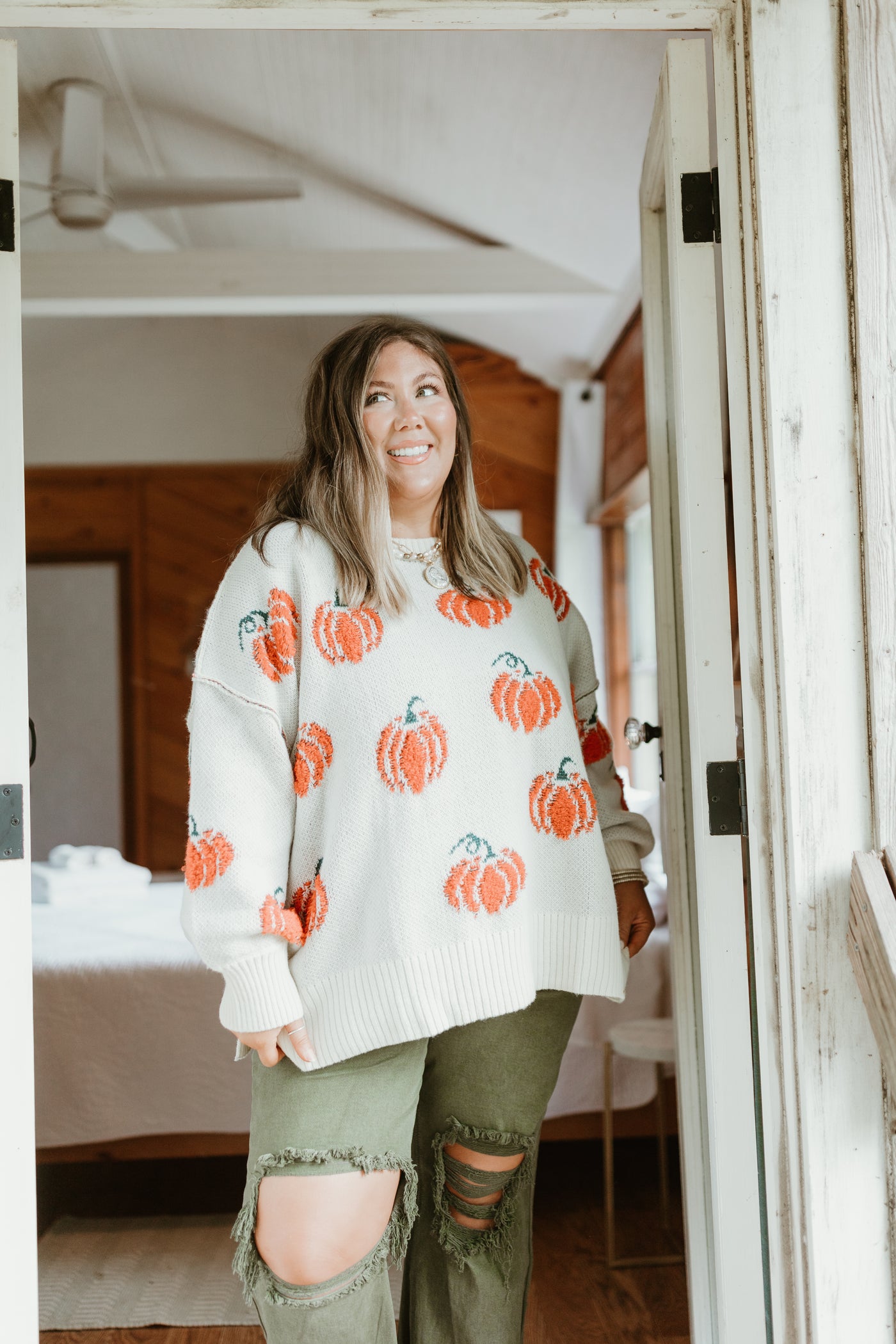 Cream and Orange Pumpkins All Over Sweater