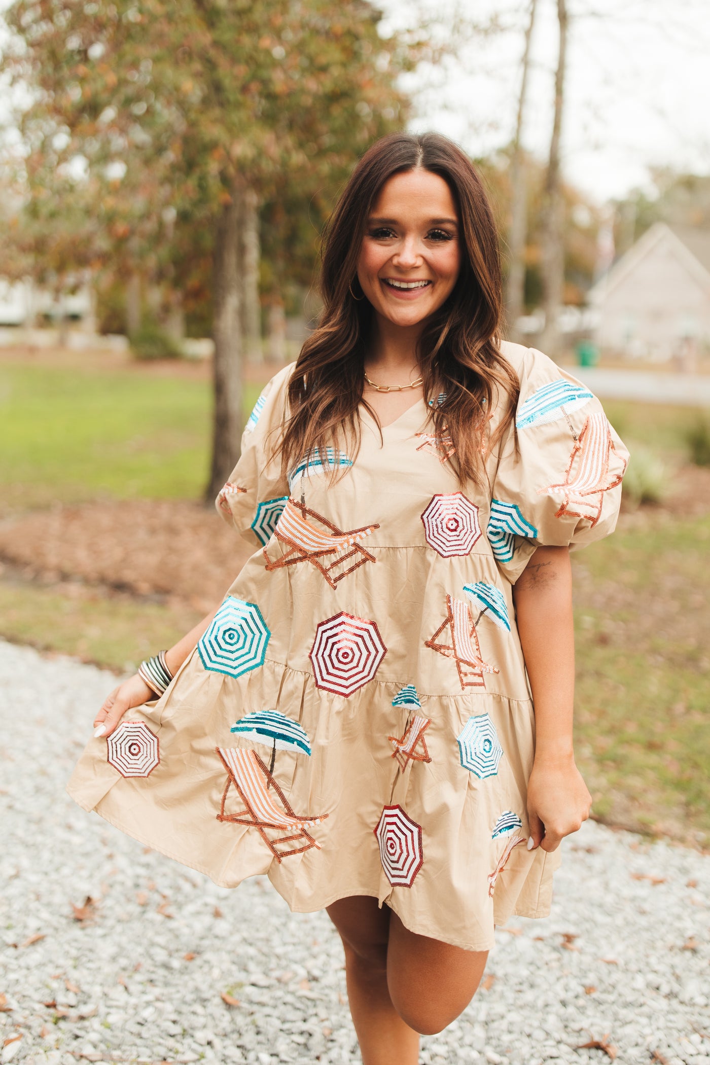 Queen Of Sparkles Tan Umbrella & Chairs Poof Sleeve Dress