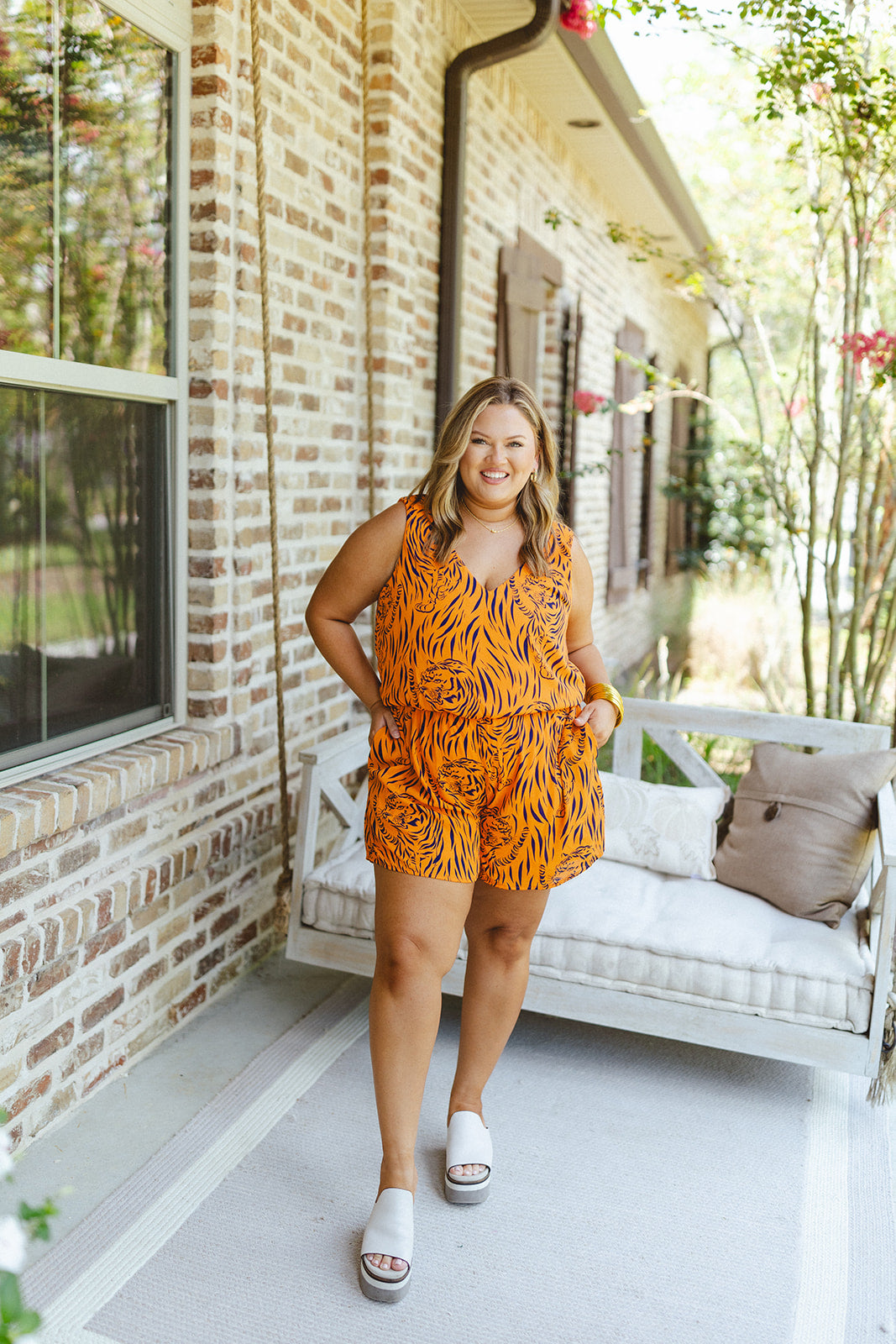 Adrienne Navy and Orange Tiger Print Sleeveless Pocket Romper