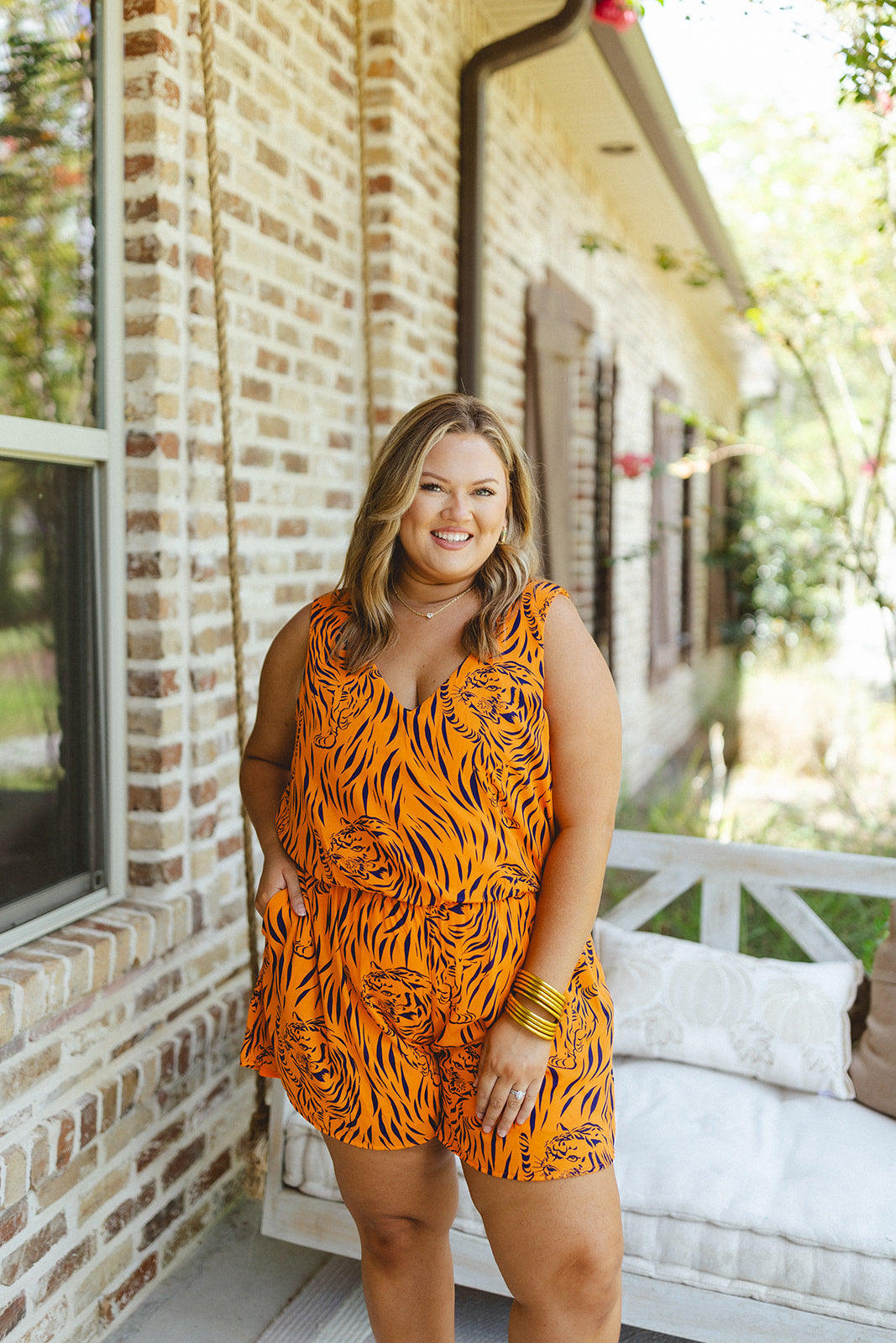 Adrienne Navy and Orange Tiger Print Sleeveless Pocket Romper